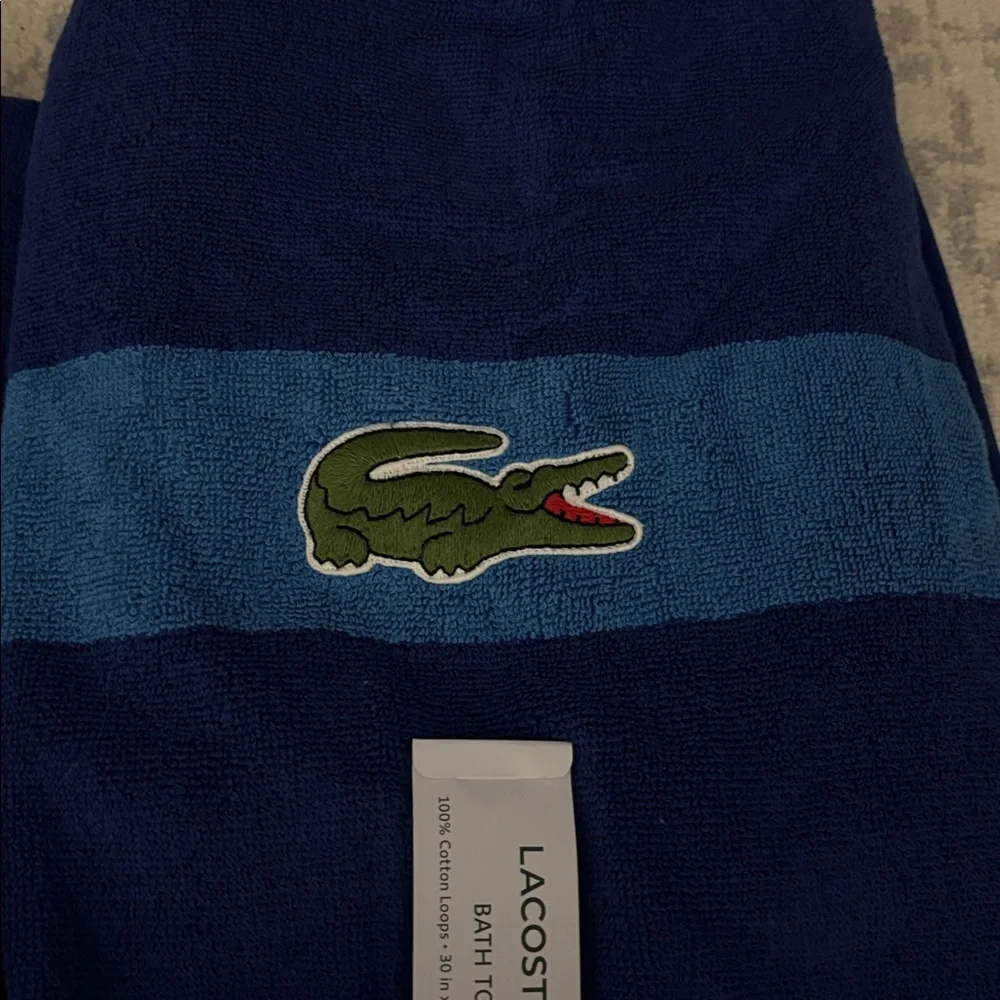 Lacoste blue Towel 30in x 52in. NWT 1